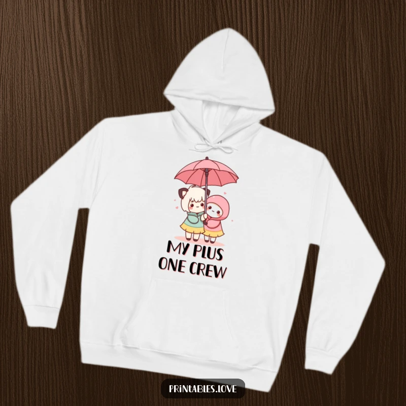 Funny Kawaii Friendship Hoodie: A warm hoodie featuring two cute characters sharing an umbrella, symbolizing togetherness.