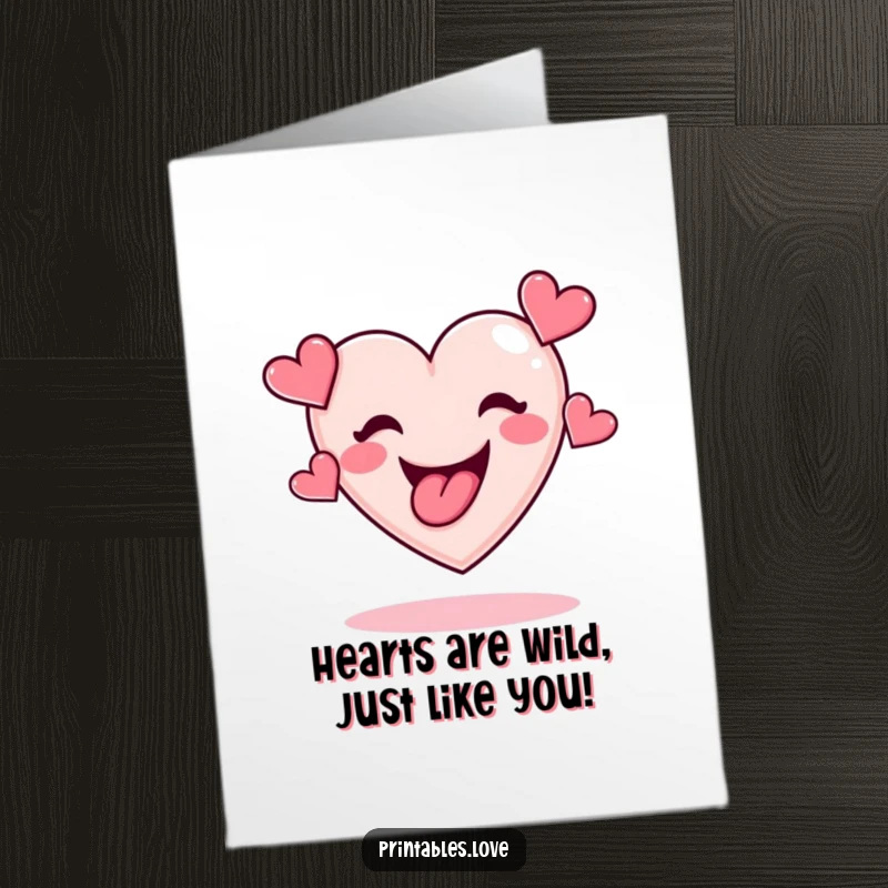 Funny Free Printable Birthday Card: A heart with a tongue out juggling hearts, spreading birthday cheer with humor.