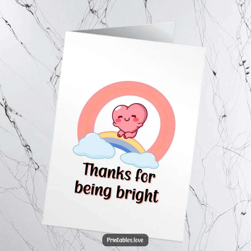 Funny Free Printable Thank You Card: a rosy-cheeked heart character slides down a rainbow with pure glee, thanking someone.