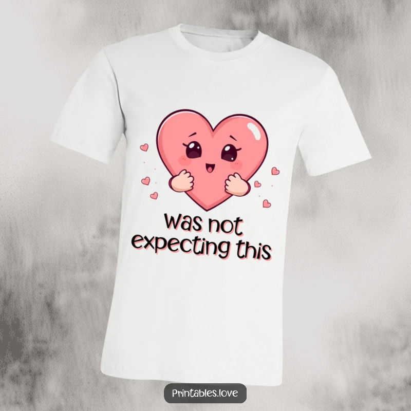 Funny t-shirt featuring a heart with small hands cupping more hearts, eyes wide with a look of pure surprise.