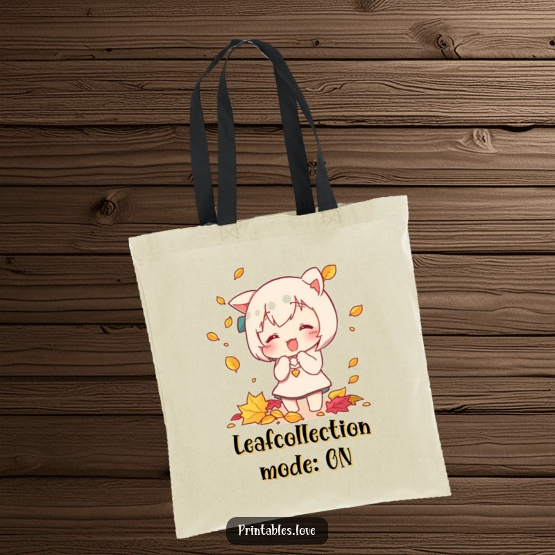 Funny Kawaii tote bag with a cute character playfully trying to catch falling autumn leaves, perfect for carrying daily items.